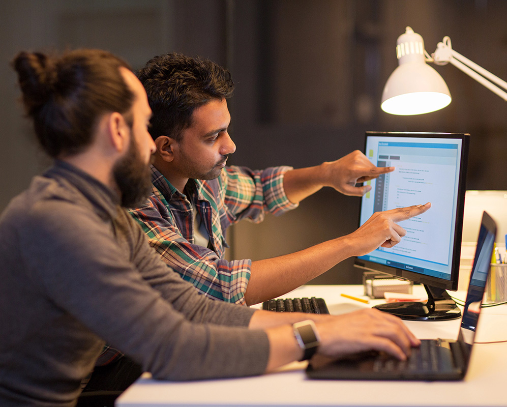 IT People working around a computer